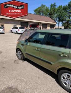 Towing Company Car delivered to repair shop Grand Rapids