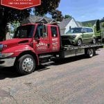 Towing Company Car on Flatbed Grand Rapids