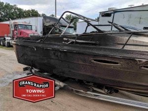 Check out side of boat after fire and see why 24-hour towing was needed